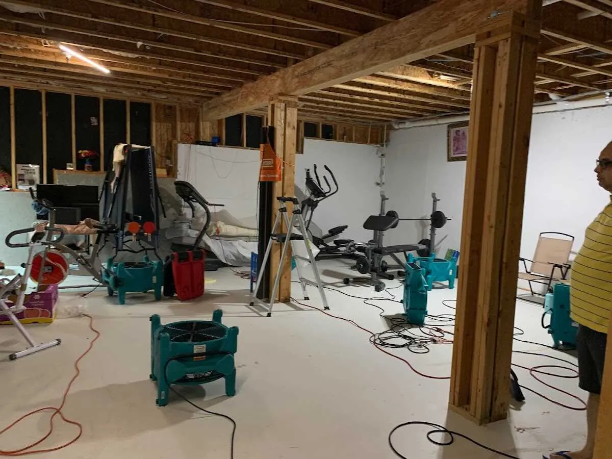 Basement drying equipment setup for Contents Cleaning & Restoration in Merrillville